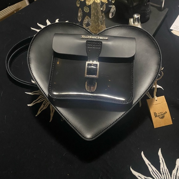 Heart shaped bag/back pack. It’s really sturdy and brand new. - Picture 4 of 6